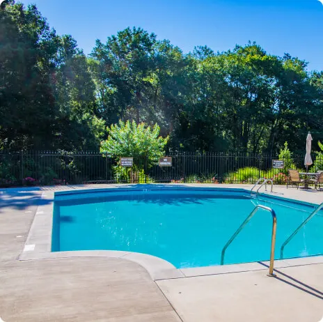 Backyard concrete pool deck