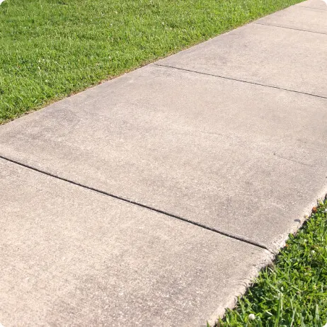 Settled sidewalk slab creating a trip hazard